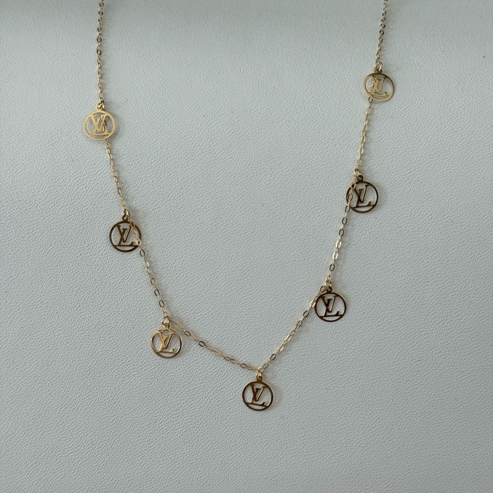 Solid 18k Gold Logo Necklace / PRICE FIRM all offers will be declined
